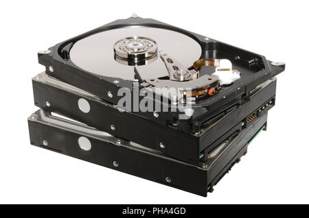 old hard drives stacked isolated on white background Stock Photo