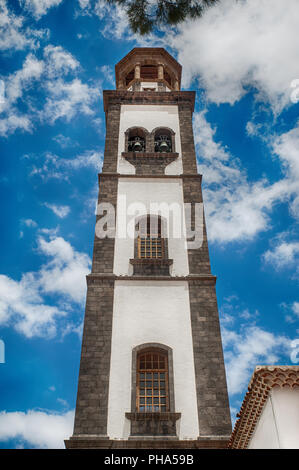 The tower of  Iglesia Nuestra Senora de La Concepcion, known the Cathedral of the city, Church of the Immaculate Conception, Santa Cruz de Tenerife Stock Photo