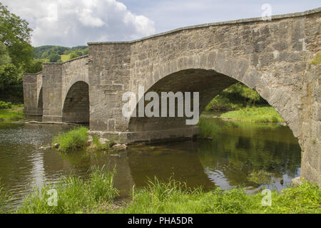 historic stone bridge in Oberregenbach, Germany Stock Photo