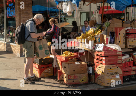 A fruit and vegetable vendor in the Chelsea neighborhood of New York on Saturday, August 25, 2018.  (© Richard B. Levine) Stock Photo