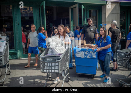 Hundreds of NYU students, some with their families, descend on Bed Bath and Beyond in the Ladies Mile shopping district in New York on Sunday, August 26, 2018 to shop to furnish their dorm rooms at the university. Besides getting a discount the students where shepherded back and forth from their dorms via buses rented for the occasion by Bed Bath and Beyond and were assisted with their purchases by Bed Bath and Beyond employees. The shopping event took place both Saturday and Sunday. (©ÊRichard B. Levine) Stock Photo