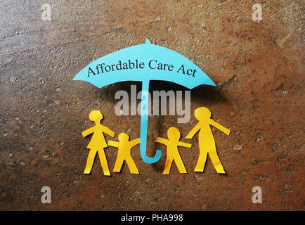 Affordable Care Act paper family Stock Photo