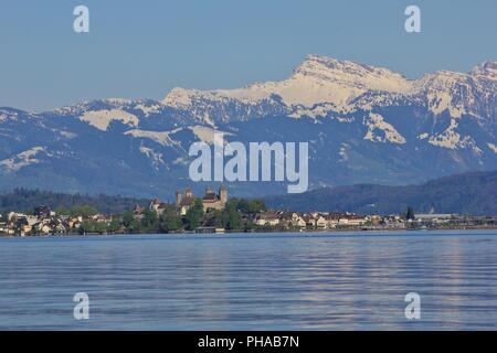 Lake Zurichsee and snow capped mountain Grosser Speer Stock Photo