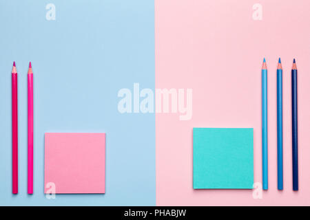 Color Pencils with Sticky Notes on Pastel Background Stock Photo