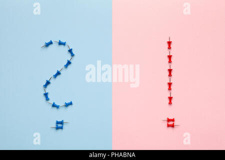 Question and Exclamation Marks on Pastel Background Stock Photo