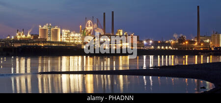 Bayer Cross in the blue hour, chemical factory at the Rhine, Leverkusen, Germany, Europe Stock Photo