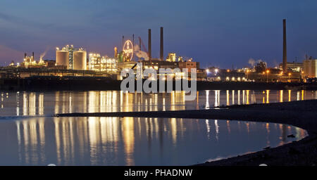 Bayer Cross in the blue hour, chemical factory at the Rhine, Leverkusen, Germany, Europe Stock Photo