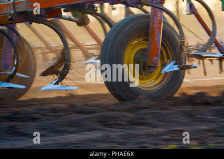 Close up of a harrow system cultivate the soil Stock Photo