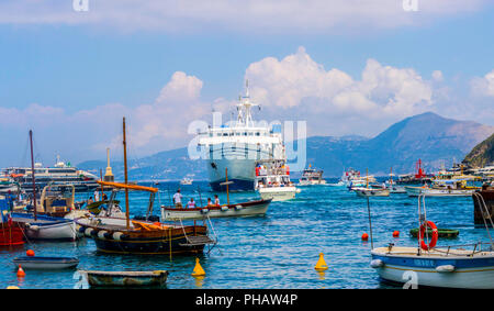 Busy sea traffic, Car Ferry Boat in Marina Grande, Capri boat, Campania, Italy travel tourism concept  holiday vacation best life busy ferry port sail Stock Photo