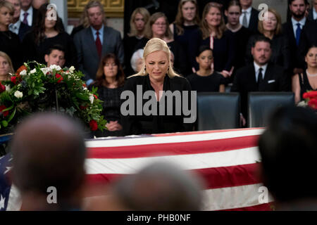 Washington. 31st Aug, 2018. Meghan McCain, daughter of, Sen. John McCain, R-Ariz., cries as she walks over to her father's casket as he lies in state in the Rotunda of the U.S. Capitol, Friday, Aug. 31, 2018, in Washington. (AP Photo/Andrew Harnik, Pool) | usage worldwide Credit: dpa/Alamy Live News Stock Photo