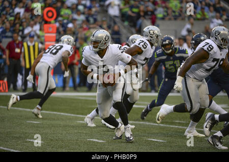 Seattle, Washington, USA. 30th Aug, 2018. Oakland quarterback EJ MANUEL (3) in action as the Oakland Raiders play the Seattle Seahawks in a preseason NFL game at Century Link Field in Seattle, WA. Credit: Jeff Halstead/ZUMA Wire/Alamy Live News Stock Photo