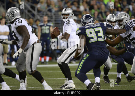 Seattle, Washington, USA. 30th Aug, 2018. Oakland quarterback EJ MANUEL (3) in action as the Oakland Raiders play the Seattle Seahawks in a preseason NFL game at Century Link Field in Seattle, WA. Credit: Jeff Halstead/ZUMA Wire/Alamy Live News Stock Photo