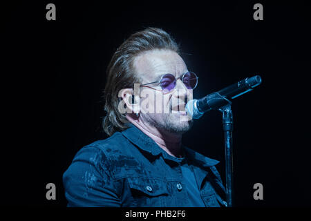 Berlin, Germany. 31st Aug, 2018. Paul David Hewson (Bono), singer of the Irish rock band U2, sings at his band's concert in the Mercedes-Benz Arena. Credit: Paul Zinken/dpa/Alamy Live News Stock Photo