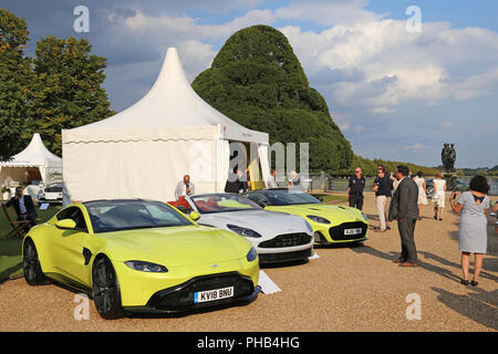 Aston Martins at trade stand, Concours of Elegance 2018 (Preview Day), 31 August 2018. Hampton Court Palace, London, UK, Europe. The world's rarest cars assembled for a three-day classic and supercar event in the gardens of the famous Royal Palace. Credit Ian Bottle/Alamy Live News Stock Photo