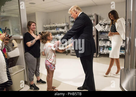 President Donald J. Trump and First Lady Melania Trump visit with patients and their parents on Friday, August 24, 2018, at Nationwide ChildrenÕs Hospital in Columbus, Ohio.  People: President Donald J. Trump and First Lady Melania Trump Stock Photo