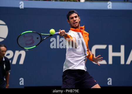 Flushing Meadows, New York - August 31, 2018: US Open Tennis:  Karen Khachanov of Russia returns a shot to Number 1 seed Rafael Nadal serving to his opponent  during their third round match at the US Open in Flushing Meadows, New York. Credit: Adam Stoltman/Alamy Live News Stock Photo