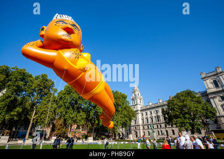 London, UK. 1st September 2018. Protesters fly a 29ft long bikini-clad blimp of London mayor Sadiq Khan over Parliament Square, Westminster. Credit: Grant Rooney/Alamy Live News Stock Photo