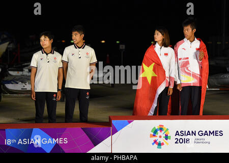 Jakarta, Indonesia. Credit: MATSUO. 31st Aug, 2018. (L-R) Hong Kong team group (HKG), China team group (CHN) Sailing : Mixed RS-One Victory ceremony at Indonesia National Sailing Center during the 2018 Jakarta Palembang Asian Games in Jakarta, Indonesia. Credit: MATSUO .K/AFLO SPORT/Alamy Live News Stock Photo