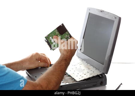 technician is working on a computer Stock Photo