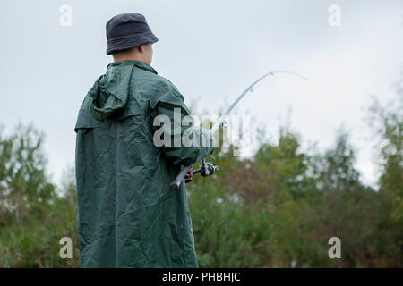 Cute boy fishing hi-res stock photography and images - Page 24 - Alamy