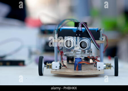 Electronic component connected with breadboard in laboratory. electrical engineering with cables and controller. Modern technologies, electronics, diy Stock Photo