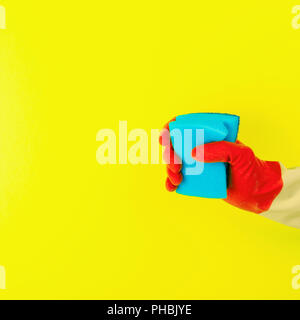 Cleaning with red rubber gloves and sponge Stock Photo