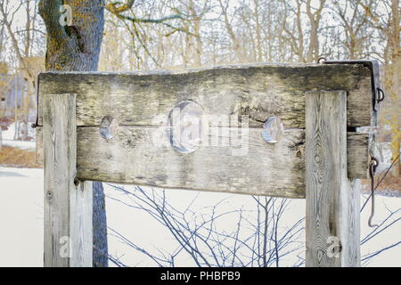 Wooden medieval torture device at oudoors Stock Photo