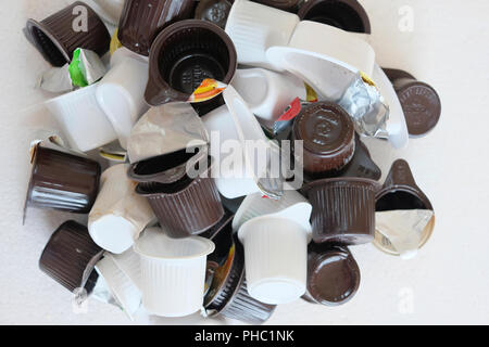 Pile of empty single use milk and cream mini cartons Stock Photo