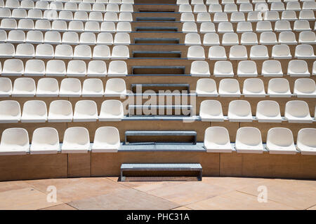 Rows of plastic seats Stock Photo