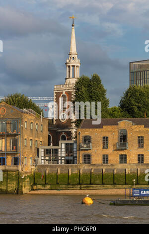 Tower of St Mary's church, Rotherhithe, Thames riverbank, London, England, UK Stock Photo