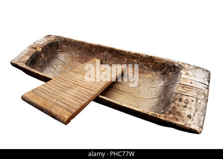 old wooden trough and washboard on a white Stock Photo