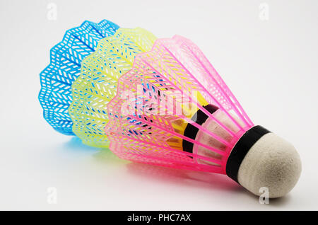 shuttlecocks in different colors on white Stock Photo