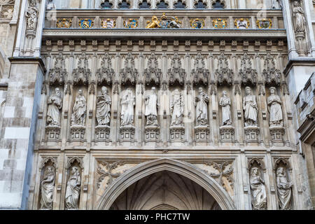 Western facade of Westminster Abbey, 10 martyrs of the 20th century, London, England, UK Stock Photo