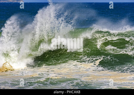 Stormy waves whit big waterspray Stock Photo