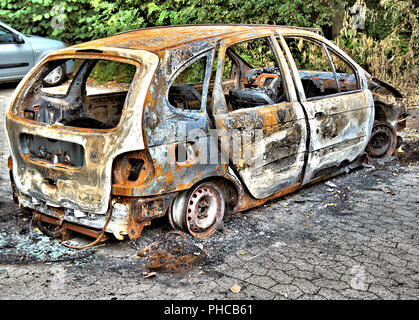 Absolutely burnt-out wreck of a car Stock Photo