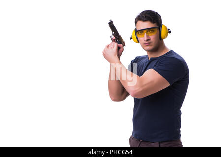 Man doing sport shooting from gun isolated on white Stock Photo