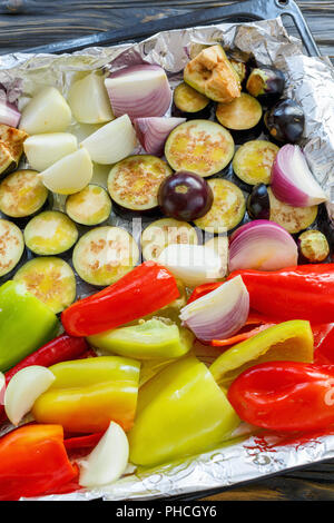 Vegetables are cut into pieces for baking. Stock Photo