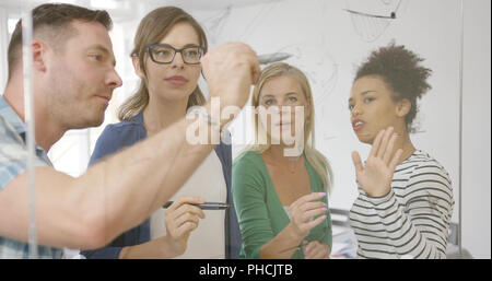 Coworkers in process of creation Stock Photo