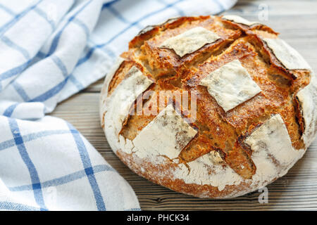 Homemade bread sourdough from wheat and rye flour. Stock Photo