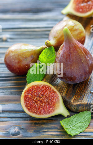 Sliced and whole fresh figs. Stock Photo