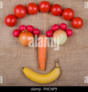 Vegetable face photographed on a Jute fabric a vegetable market Stock Photo