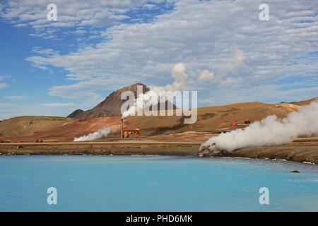 Turquoise thermal lake near Reykjahlid, Iceland. Old powerhouse. Stock Photo