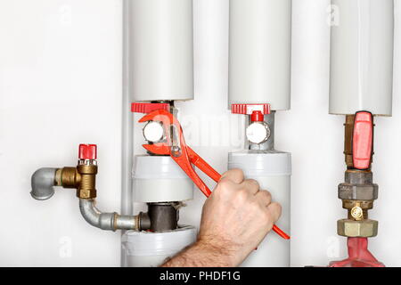 working on pipes Stock Photo