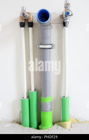 water pipes in new kitchen Stock Photo