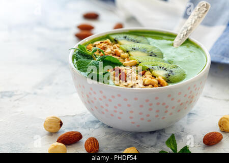 Green smoothie bowl for a healthy breakfast. Stock Photo