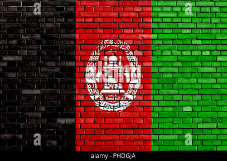 flag of Afghanistan painted on brick wall Stock Photo