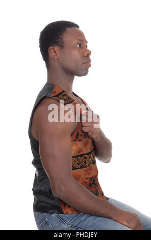 Good looking African man in a brown vest Stock Photo