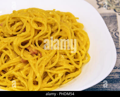spaghetti alla carbonara with bacon, eggs, and pepper Stock Photo