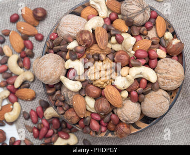 Assorted nuts in bowl Stock Photo