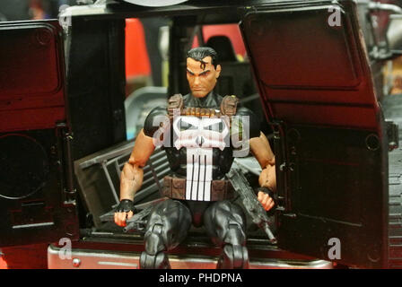 Fiction character of PUNISHER from MARVEL movies and comic. PUNISHER action figure toys in various size display for the public. Stock Photo